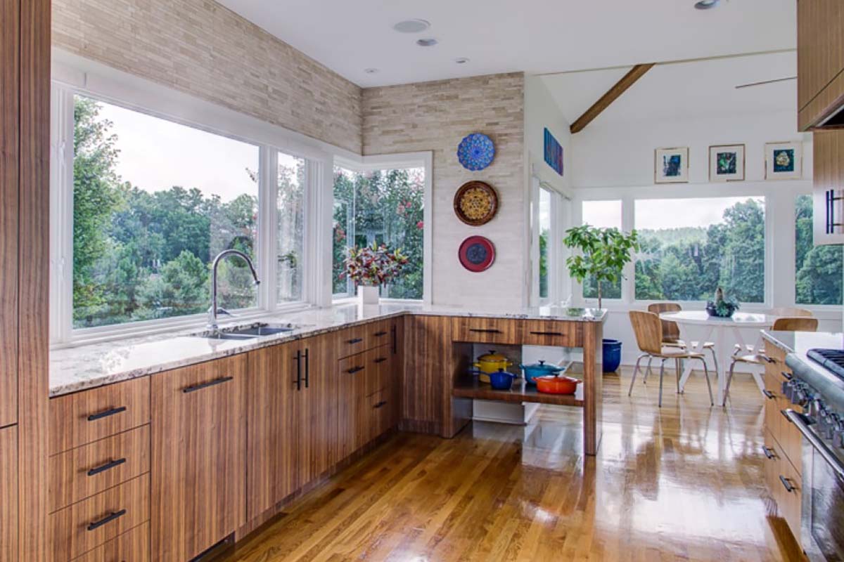 wooden kitchen with dining room