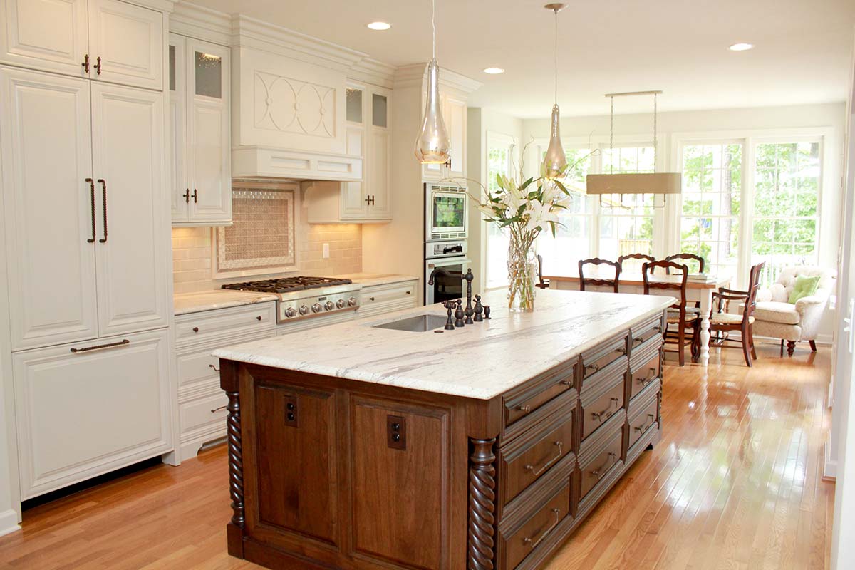 white kitchen with brown kitchen island